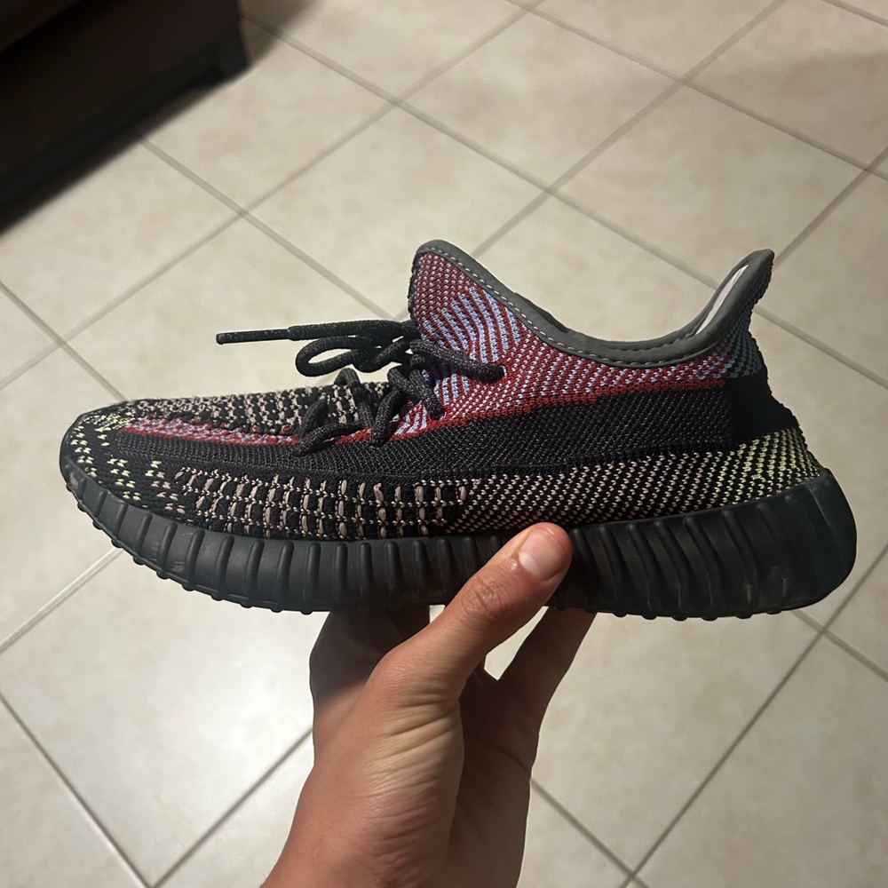 Yeezy Black and Red Athletic Shoes